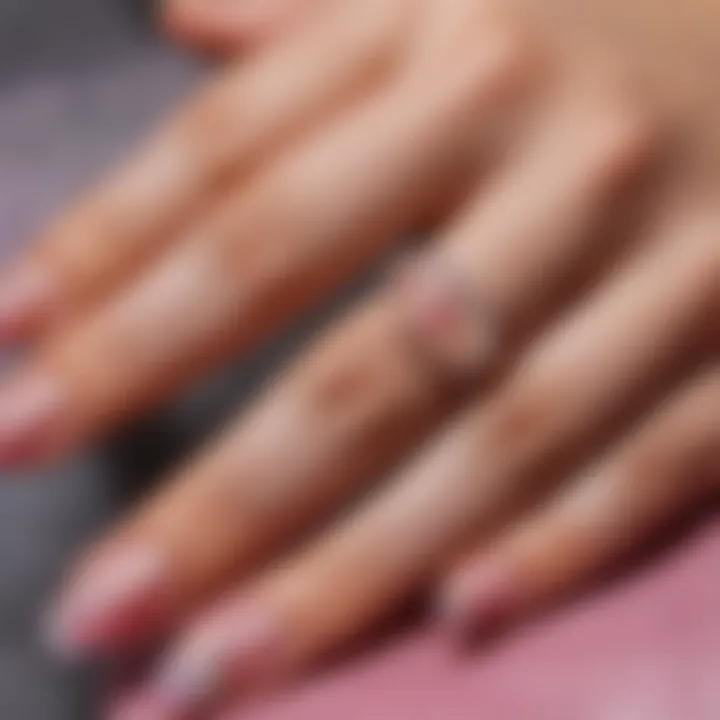 Close-up of jelly nail wraps being applied