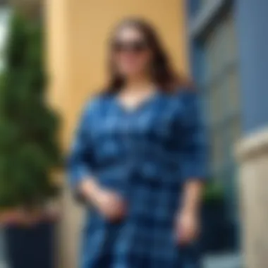 Stylish plus size woman wearing a blue plaid dress