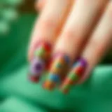 Vibrant floral nail design showcasing intricate foil patterns