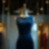 Elegant navy blue skin tight dress showcased on a mannequin