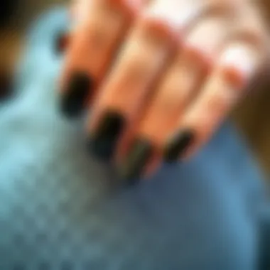 Stylish display of various black French tip press-on nail sets