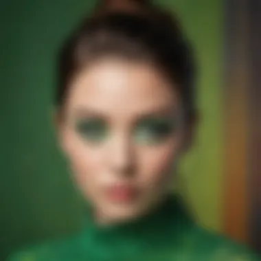 A model adorned with green false lashes elegantly positioned against a colorful background.