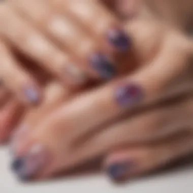 Close-up of a beautifully applied B color nail wrap on a nail