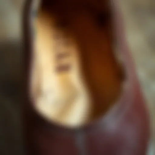 Close-up of worn shoe lining needing repair