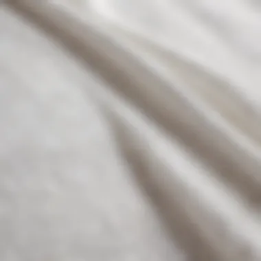 Close-up view of delicate fabric texture of a white sheer table runner