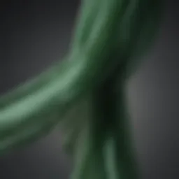 Elegant draping of green chiffon ribbon showcasing its translucency and flow