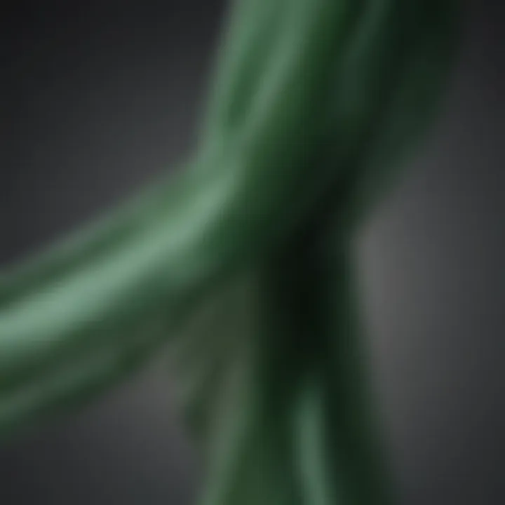 Elegant draping of green chiffon ribbon showcasing its translucency and flow